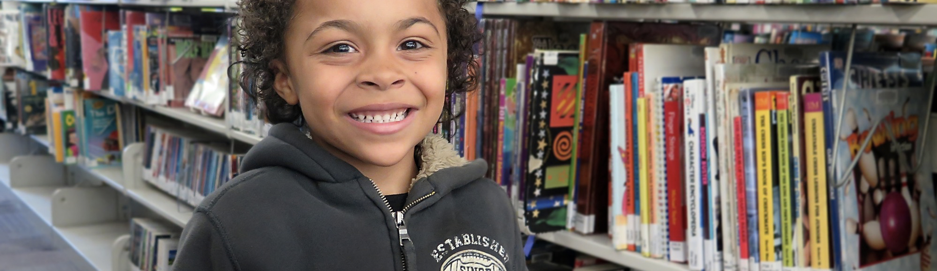 A young reader at the library